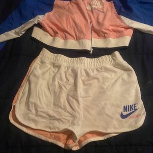 Nike sports wear short set. Blue/pink. Jacket is crop top length
